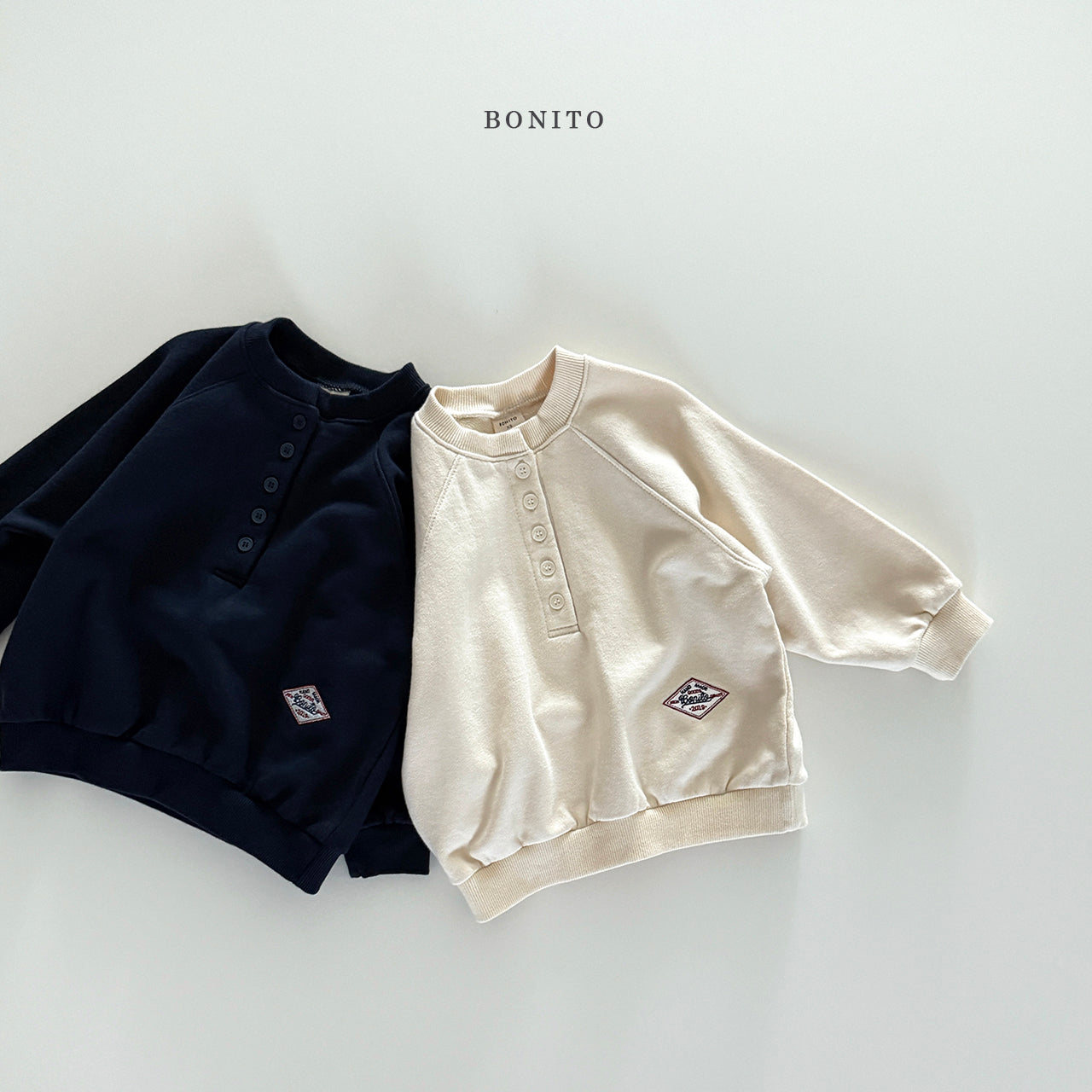 Henley Raglan Sweatshirt