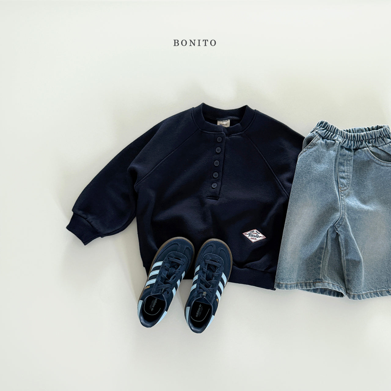 Henley Raglan Sweatshirt