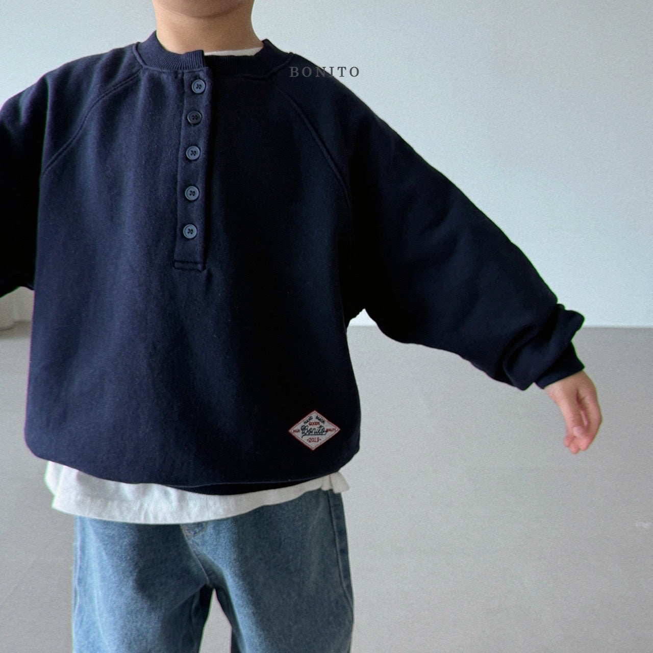 Henley Raglan Sweatshirt